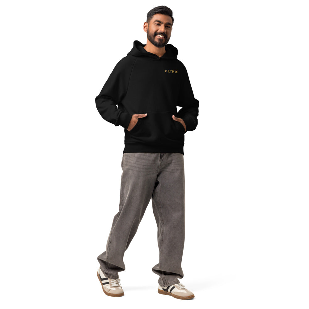 Atelier 560 Hoodie by ORTHIC in Black, on model, side